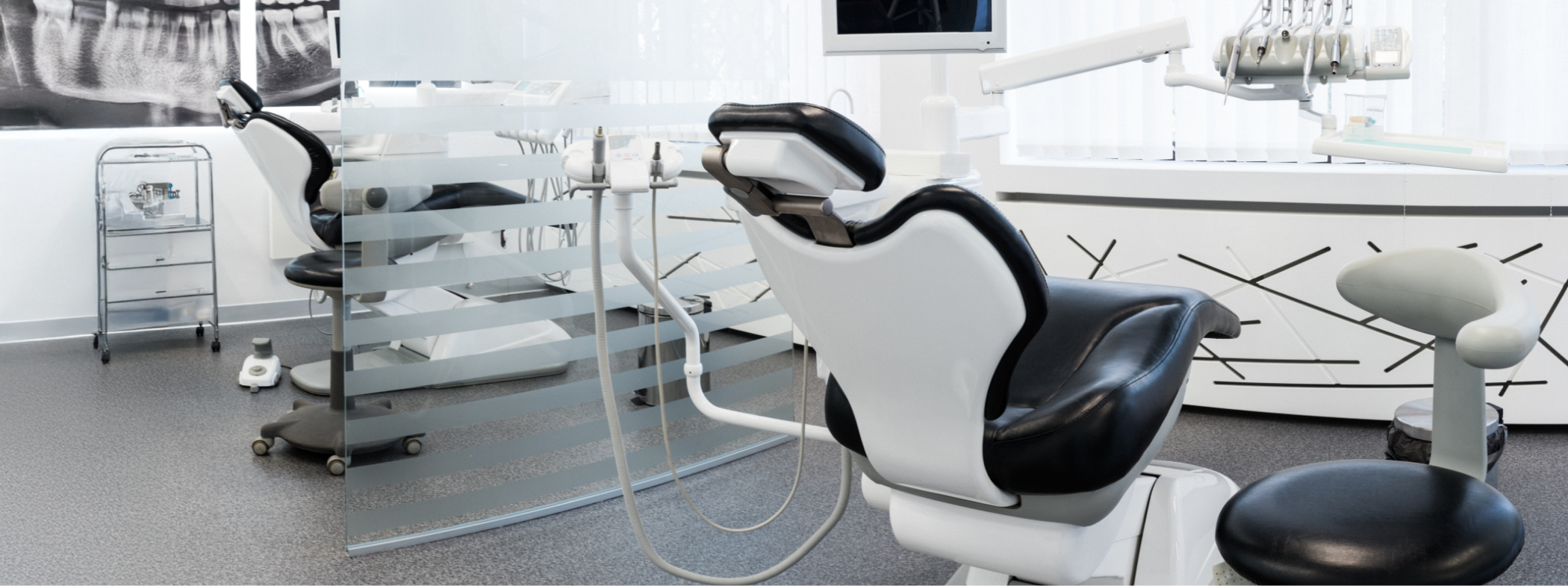 Dental treatment room with sleek white walls in Lillington dental office